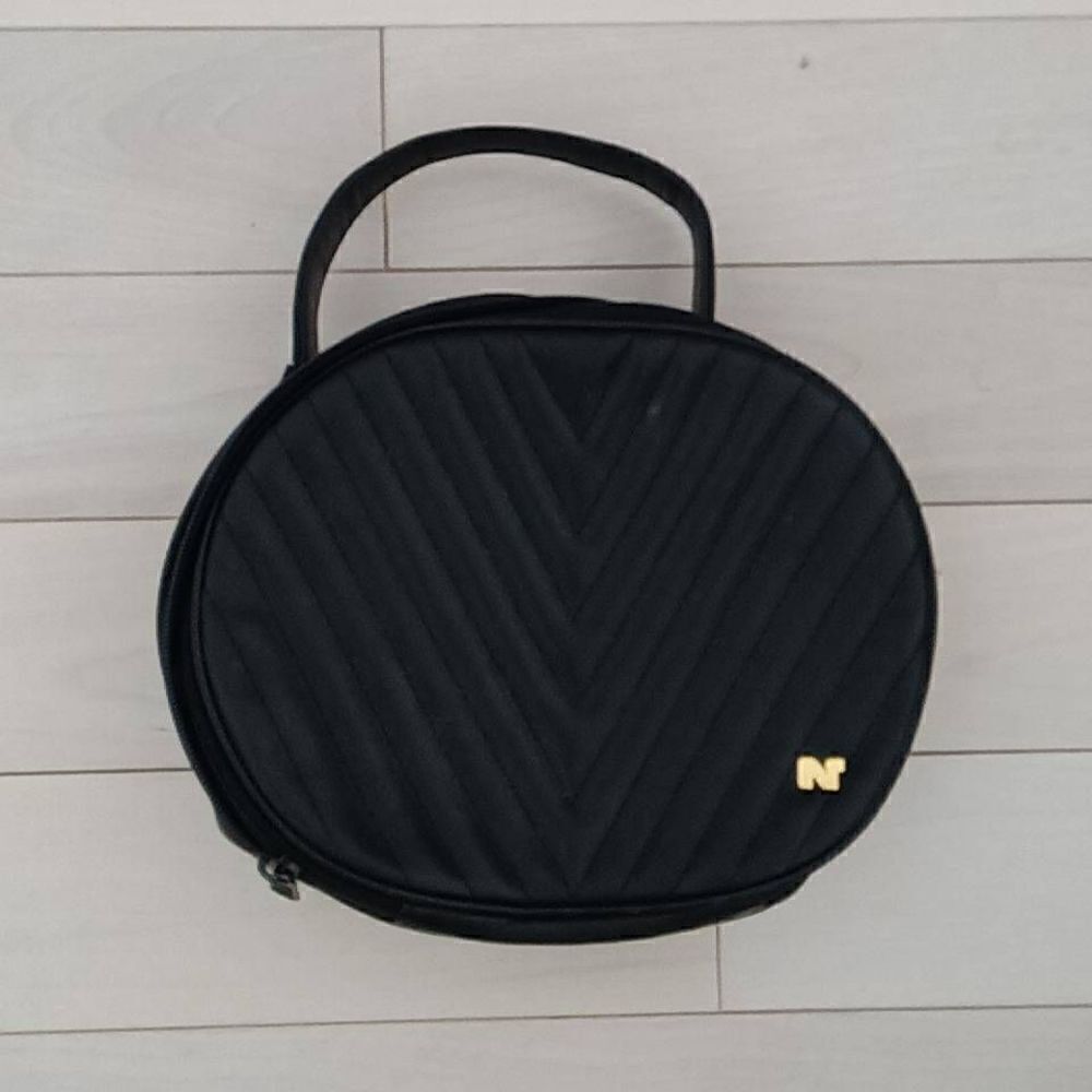 Nina Ricci Women's Quilted Chevrolet Pattern Round Hand Bag Black